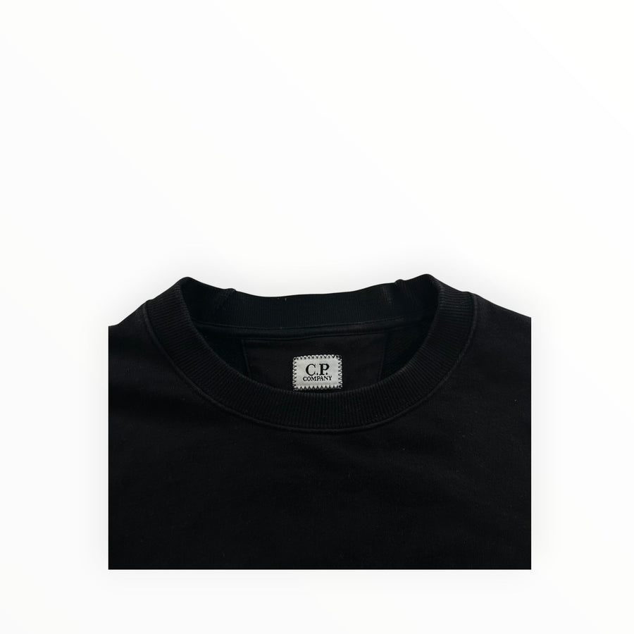 Secondstore black C.P. Company crewneck sweatshirt featuring a ribbed collar and internal brand label
