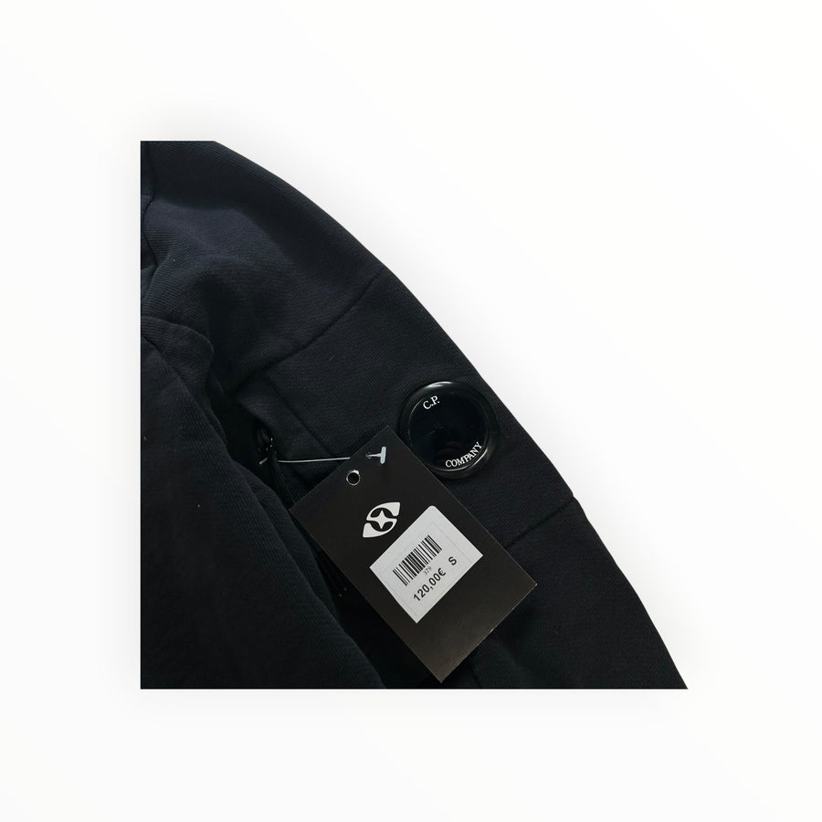 Secondstore C.P. Company black cotton sweatshirt sleeve featuring the iconic signature lens detail and brand tag