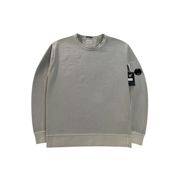 Secondstore C.P. Company grey cotton crewneck sweatshirt with iconic sleeve lens pocket and ribbed trim.