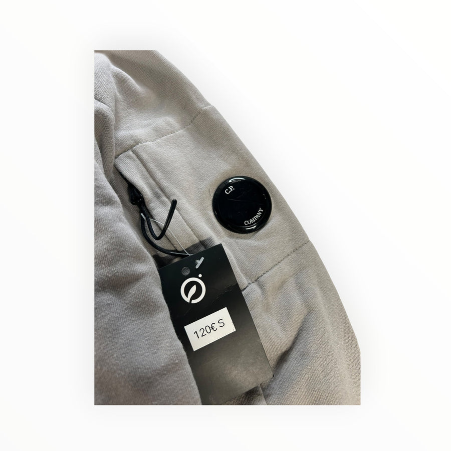 Secondstore C.P. Company grey cotton sweatshirt featuring the iconic lens detail on a sleeve pocket with a price tag.