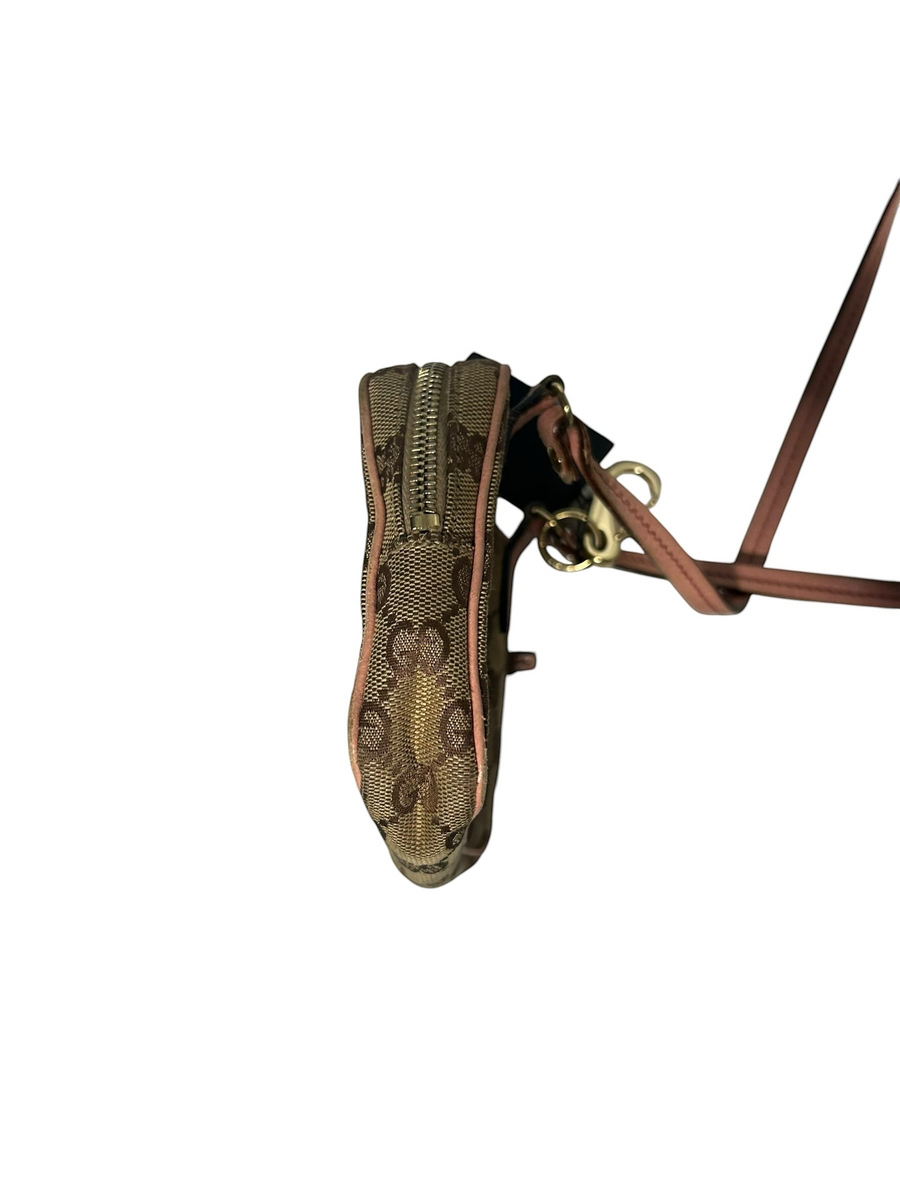 Secondstore Gucci monogram canvas crossbody bag with pink leather trim and side view of the zip closure