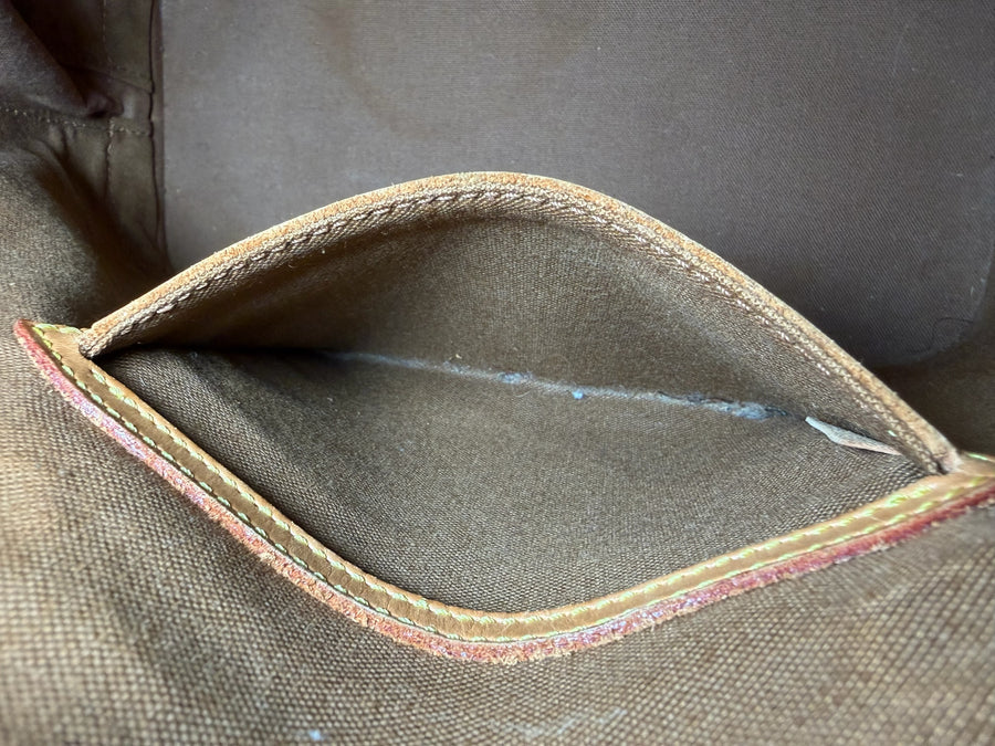 Poche intérieure en toile marron du sac à main Secondstore Louis Vuitton Alma avec finitions en cuir