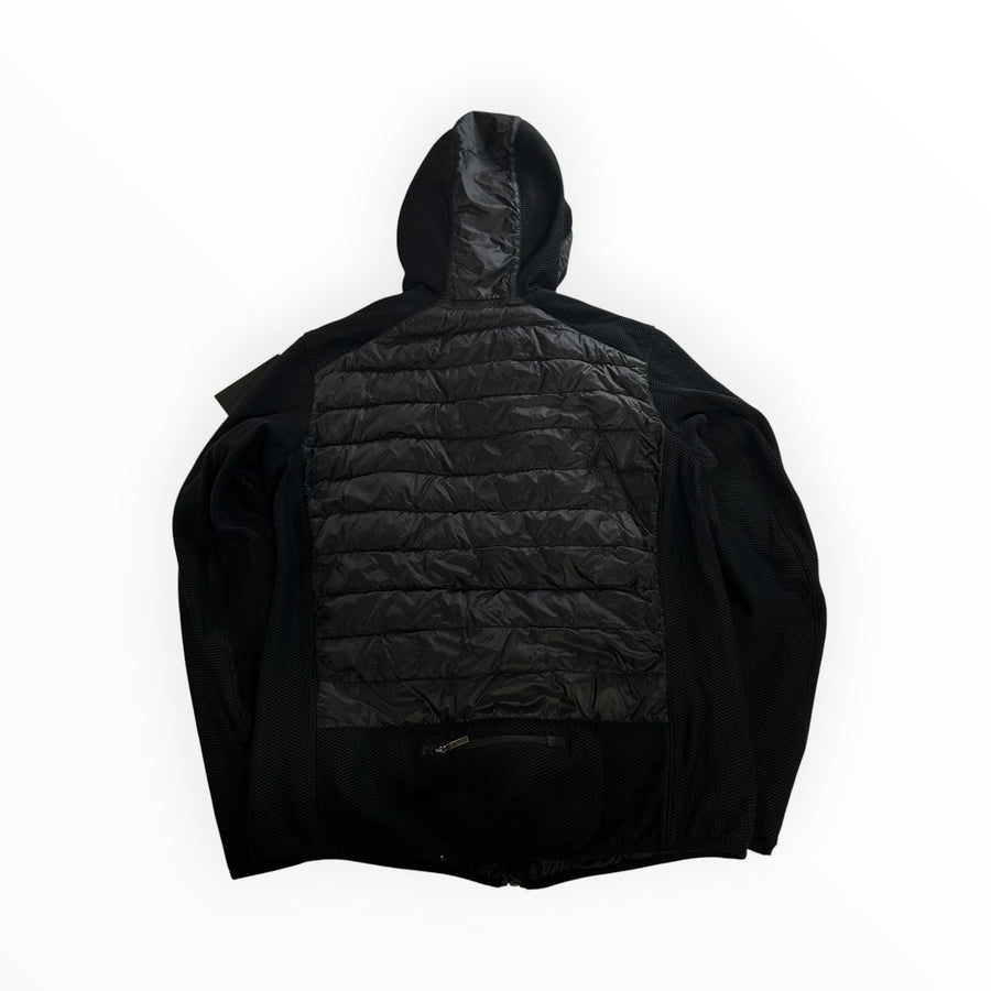 Vue arrière de la veste hybride noire Secondstore Parajumpers avec panneaux matelassés et maille technique.