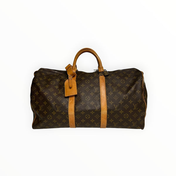Sac de voyage Louis Vuitton Keepall en toile Monogram marron avec garnitures en cuir naturel chez Secondstore