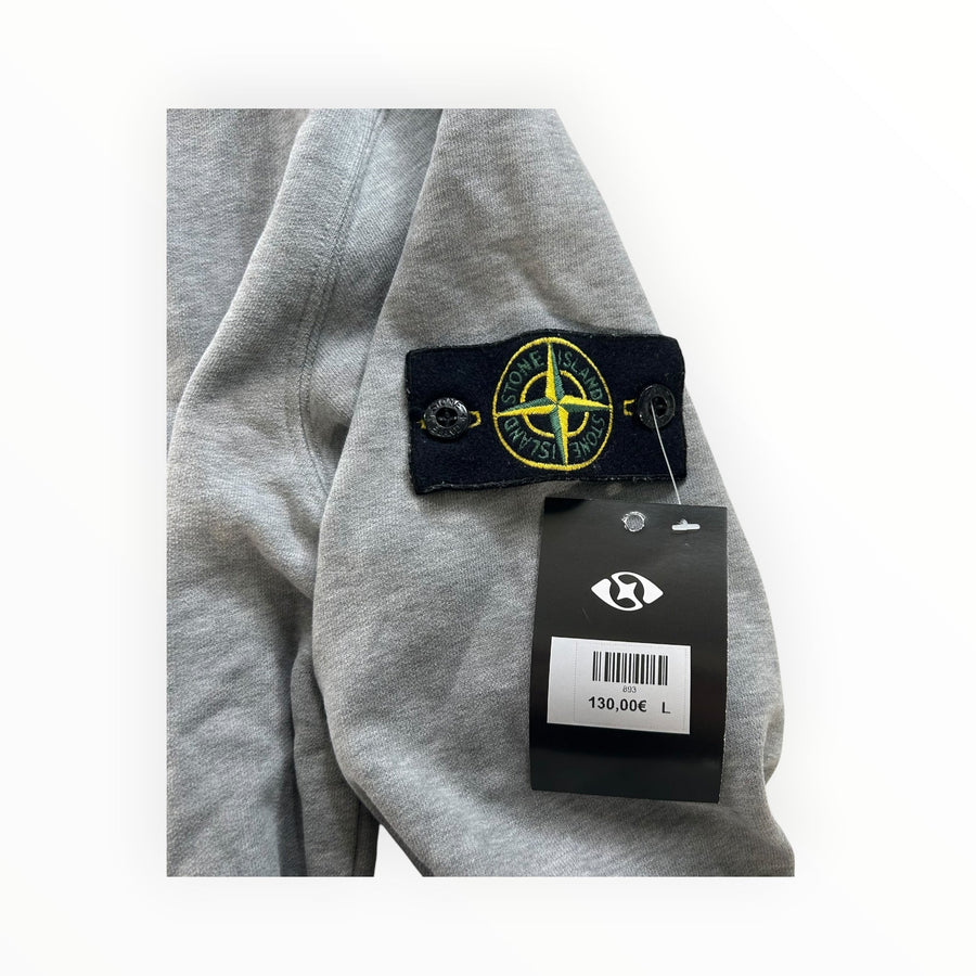 Secondstore Stone Island grey cotton sweatshirt sleeve with iconic embroidered compass patch and retail price tag