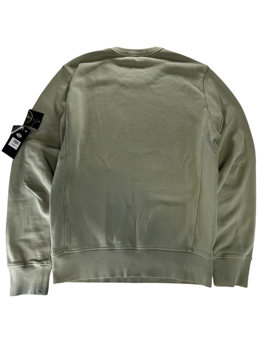 Secondstore sage green Stone Island crewneck sweatshirt with signature compass patch on the sleeve, back view.