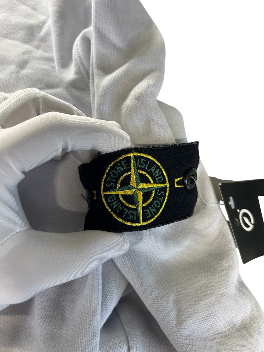 Secondstore white Stone Island crewneck sweatshirt featuring the iconic compass patch on the sleeve