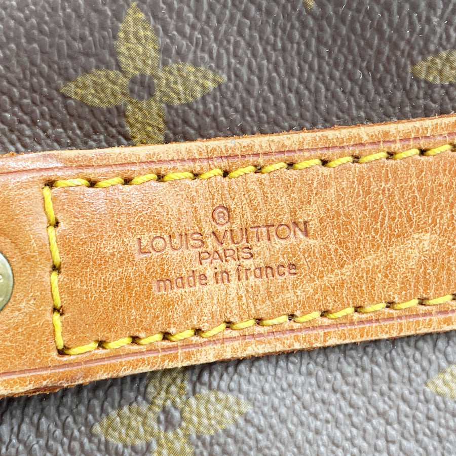 Secondstore Louis Vuitton Keepall 55 natural leather handle detail with embossed logo and yellow stitching