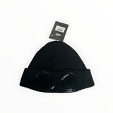 Secondstore black ribbed wool C.P. Company beanie featuring signature integrated goggles and a turn-up hem.