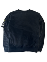 Secondstore black Stone Island crewneck sweatshirt with iconic compass patch on the sleeve.