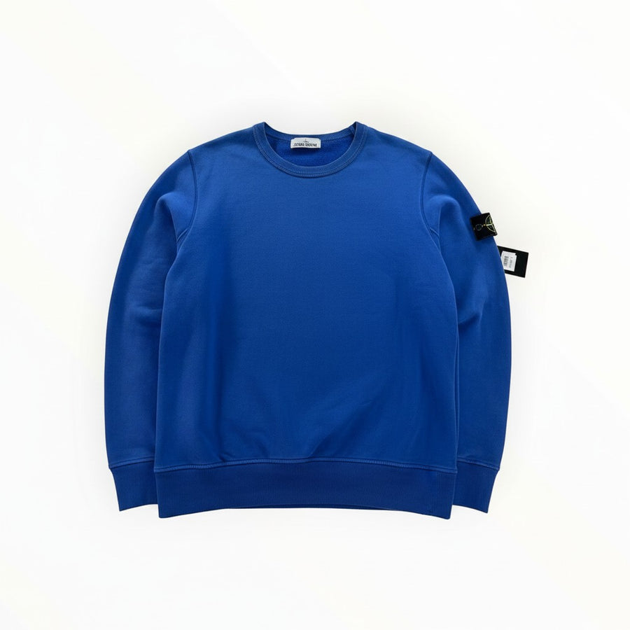 Secondstore blue Stone Island crewneck sweatshirt in premium cotton with the signature compass patch on the sleeve.