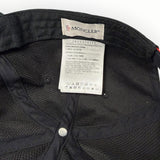 Étiquette intérieure de la casquette de baseball noire Secondstore Moncler avec détails de fabrication et logo