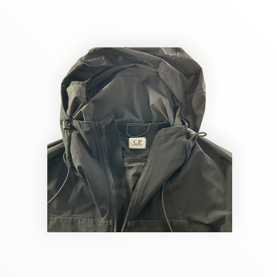 Secondstore C.P. Company Pro-Tek black hooded jacket with adjustable drawstring hood and front zip closure