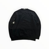 Back view of a black Secondstore C.P. Company crewneck sweatshirt in soft cotton with ribbed hem and cuffs