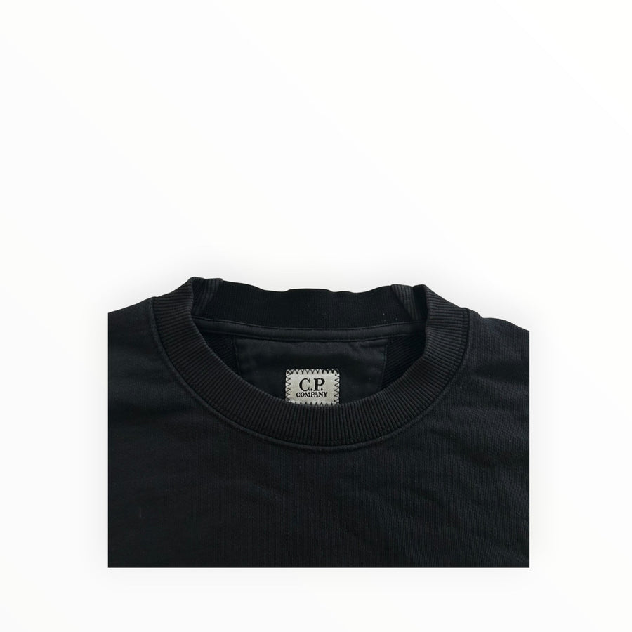 Secondstore black C.P. Company crewneck sweatshirt featuring a ribbed neckline and internal brand label detail.