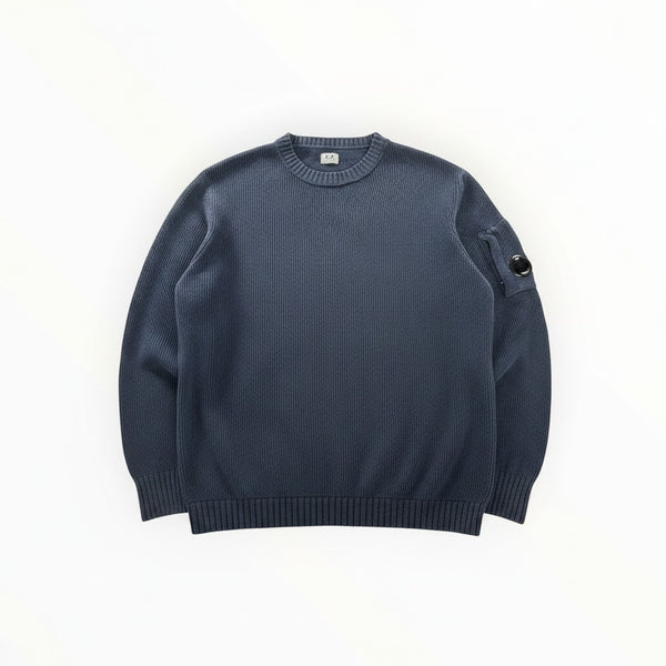 Secondstore blue C.P. Company ribbed knit crewneck sweater with signature lens detail on the sleeve.