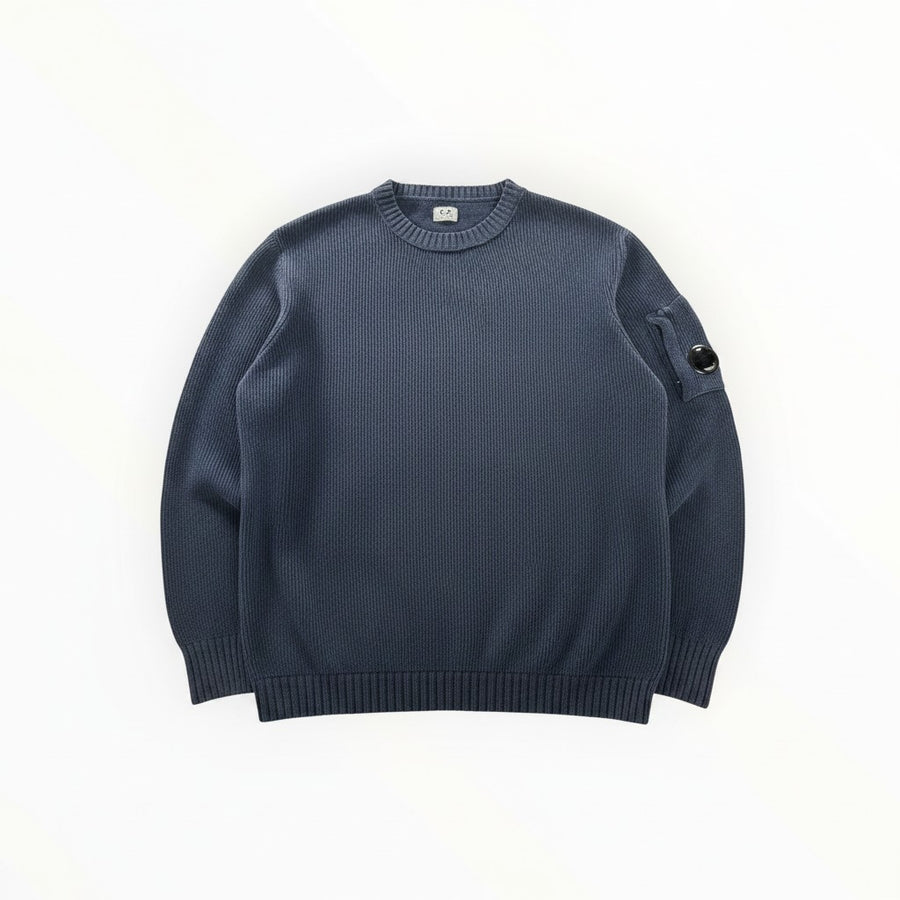 Secondstore blue C.P. Company ribbed knit crewneck sweater with signature lens detail on the sleeve.