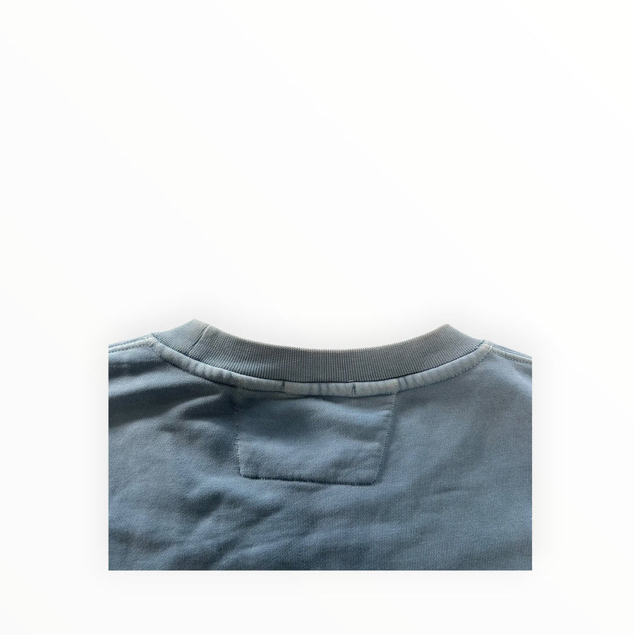 Secondstore C.P. Company crewneck sweatshirt in faded blue cotton with ribbed collar and resist dyed finish