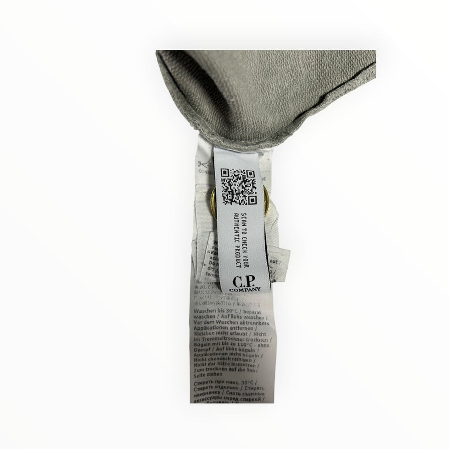 Secondstore C.P. Company sweatshirt interior care label with authentication QR code and brand logo