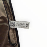 Étiquette d'authenticité avec code QR à l'intérieur d'une veste technique Secondstore C.P. Company couleur terre
