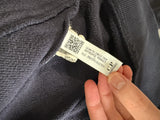Étiquette d'authenticité avec code QR sur un sweat à capuche noir Secondstore C.P. Company