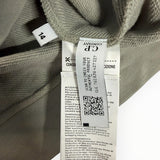 Étiquette intérieure d'authenticité Secondstore sur un sweat-shirt taupe en coton de C.P. Company