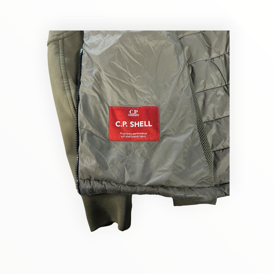 Secondstore C.P. Company Goggle Jacket interior showing the red C.P. Shell performance fabric label and quilting.