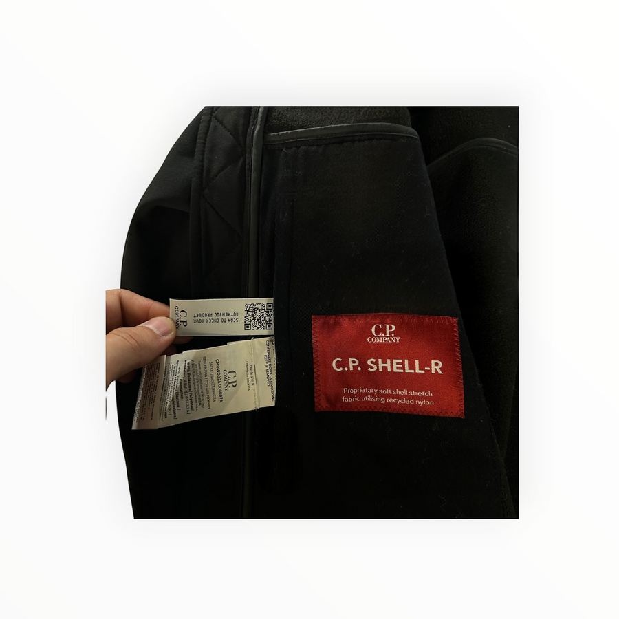 Secondstore C.P. Company Goggle Jacket interior label showing C.P. Shell-R recycled nylon fabric and authenticity tag
