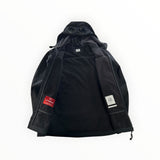 Veste noire Secondstore C.P. Company Goggle en tissu technique Shell-R avec capuche à lunettes et doublure polaire.