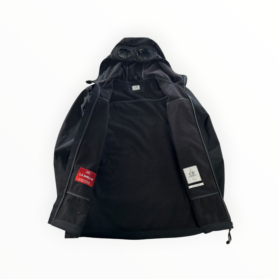 Veste noire Secondstore C.P. Company Goggle en tissu technique Shell-R avec capuche à lunettes et doublure polaire.