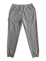 Secondstore grey C.P Company jogging pants featuring a back view with ribbed cuffs and side cargo pocket detail.