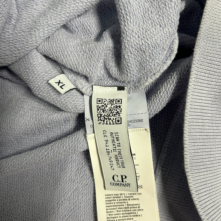 Secondstore C.P. Company light grey cotton sweatshirt interior label with QR code and size XL tag