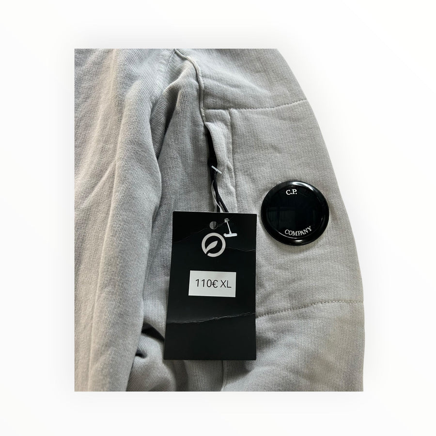 Secondstore C.P. Company grey cotton crewneck sweatshirt sleeve with iconic black lens detail and retail price tag