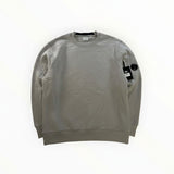 Secondstore C.P. Company grey cotton crew neck sweatshirt with signature lens detail on the zipped sleeve pocket.