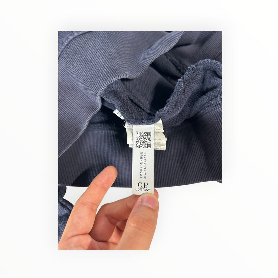 Secondstore C.P. Company navy cotton fleece hoodie interior label with authenticity QR code and ribbed hem detail