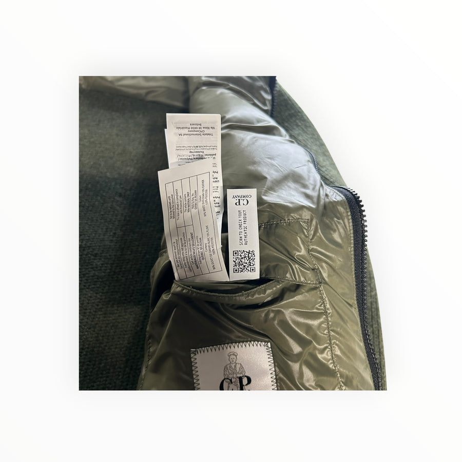 Secondstore C.P. Company olive green down jacket interior with authentic product QR code label and care tags