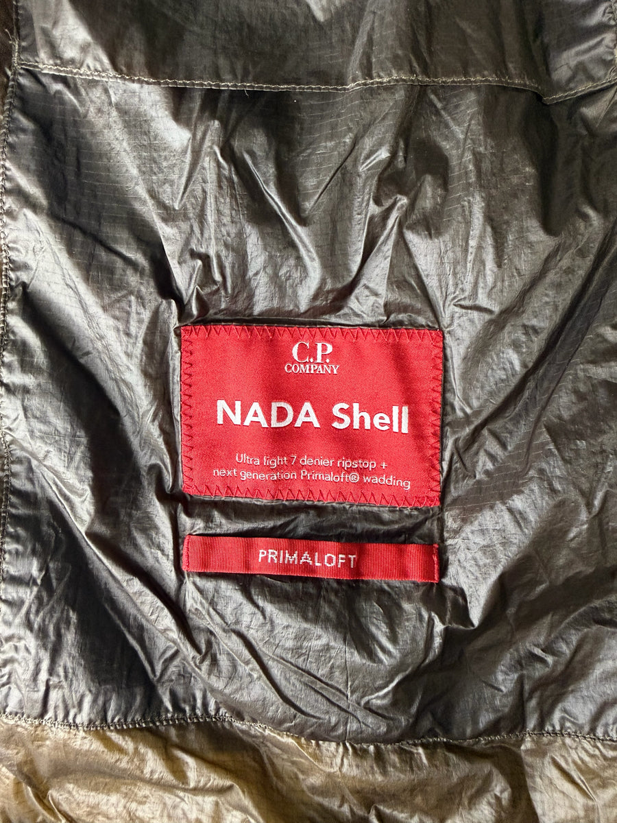 Étiquette intérieure Secondstore sur veste C.P. Company Nada Shell en ripstop vert olive avec rembourrage Primaloft