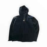 Secondstore C.P. Company navy blue Pro-Tek hooded jacket with signature sleeve lens and zip front closure.