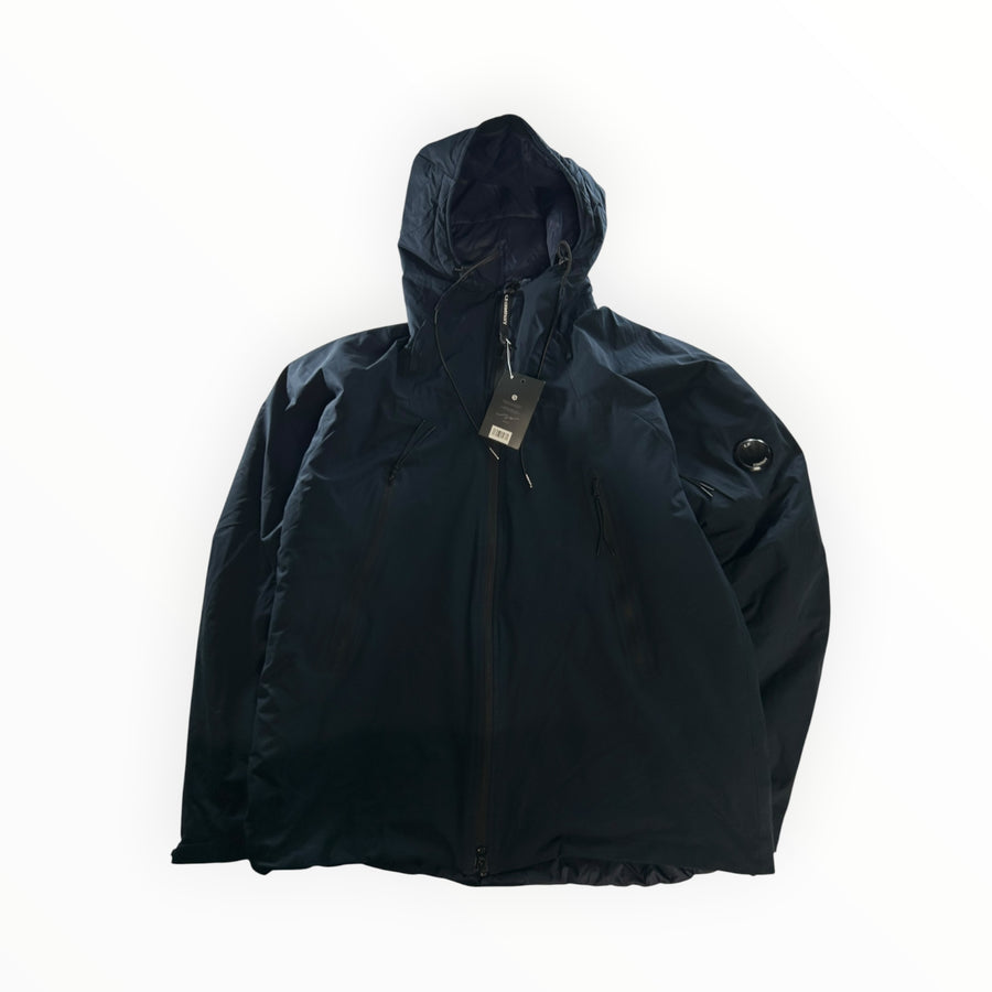 Secondstore C.P. Company navy blue Pro-Tek hooded jacket with signature sleeve lens and zip front closure.