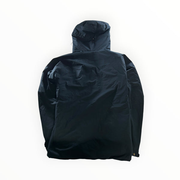 Secondstore C.P. Company Pro-Tek hooded jacket in navy blue, featuring a water-resistant finish and back view.