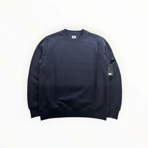 Secondstore navy C.P. Company crewneck sweatshirt in soft cotton with signature lens detail on the left sleeve.