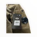 Secondstore olive-khaki C.P. Company cotton hooded sweatshirt featuring the iconic sleeve lens detail and brand tag.