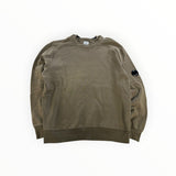 Secondstore C.P. Company olive-khaki cotton crewneck sweatshirt with signature lens utility pocket on the sleeve.