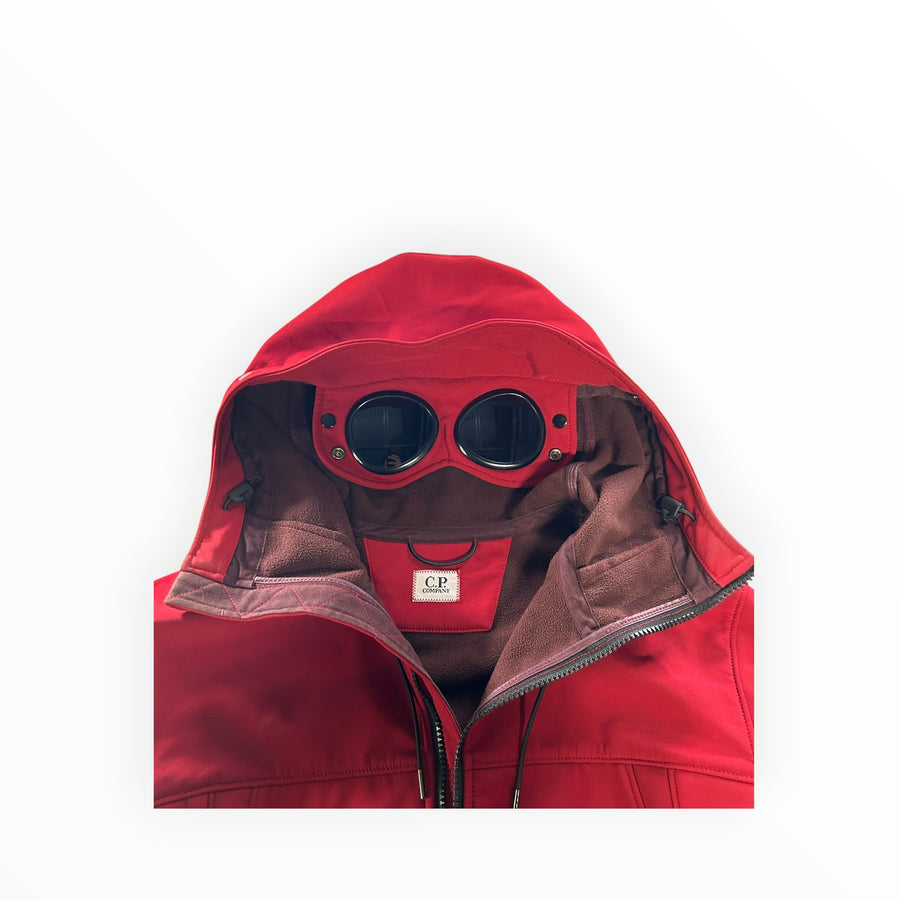 Secondstore C.P. Company red soft-shell Goggle Jacket with fleece lining and integrated hood goggles