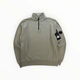 Secondstore sage-grey C.P. Company cotton quarter-zip sweatshirt with signature sleeve lens pocket and ribbed trim.