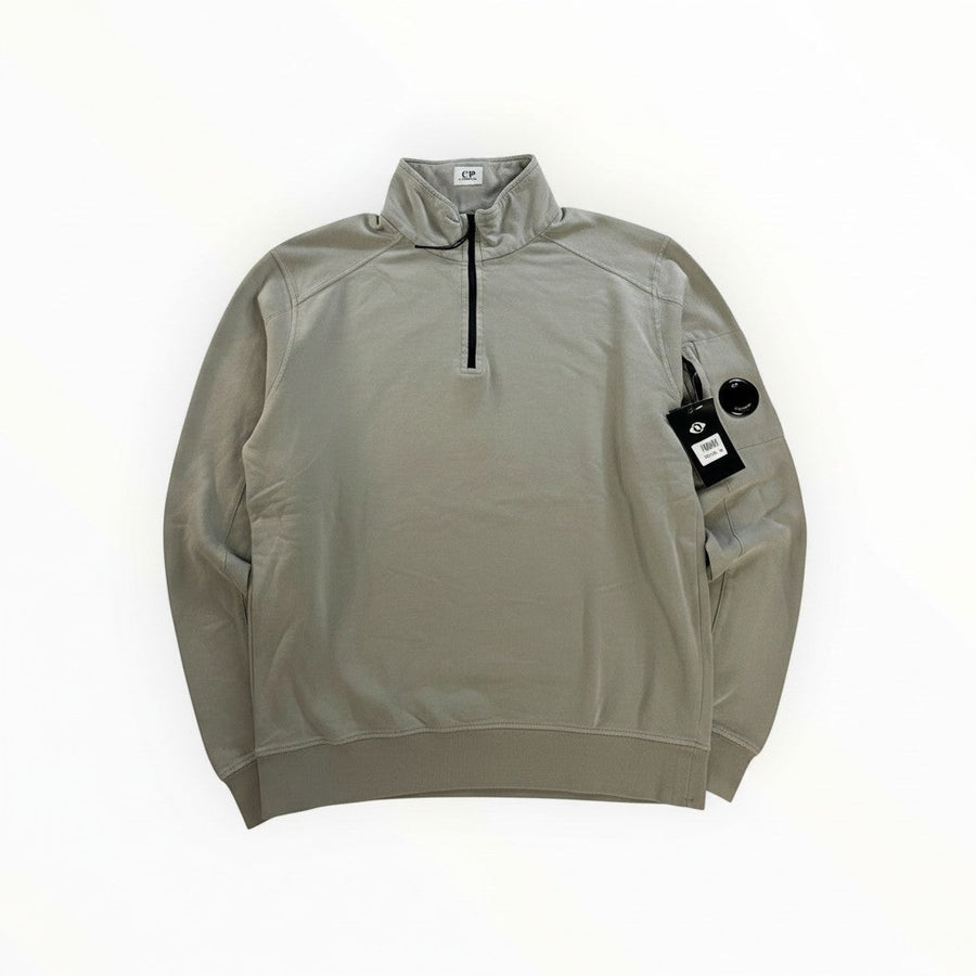 Secondstore sage-grey C.P. Company cotton quarter-zip sweatshirt with signature sleeve lens pocket and ribbed trim.