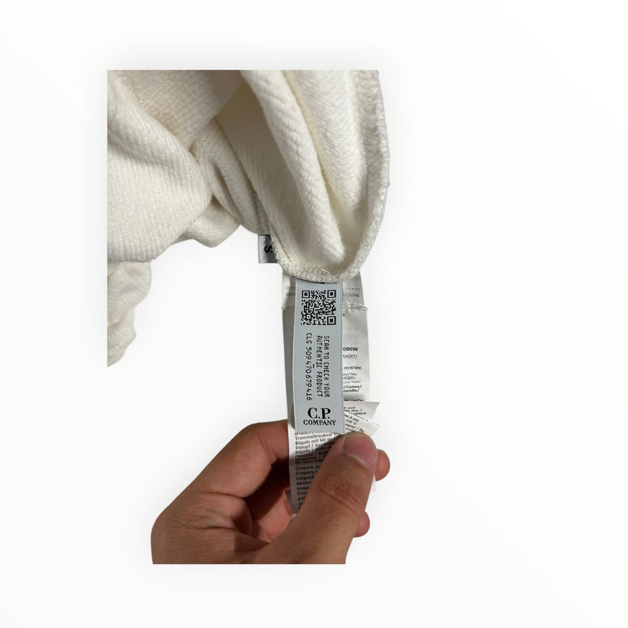 Secondstore C.P. Company off-white sweatshirt interior care label with authentication QR code and branding