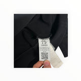Secondstore C.P. Company black sweatshirt interior label with authenticity QR code and size tag