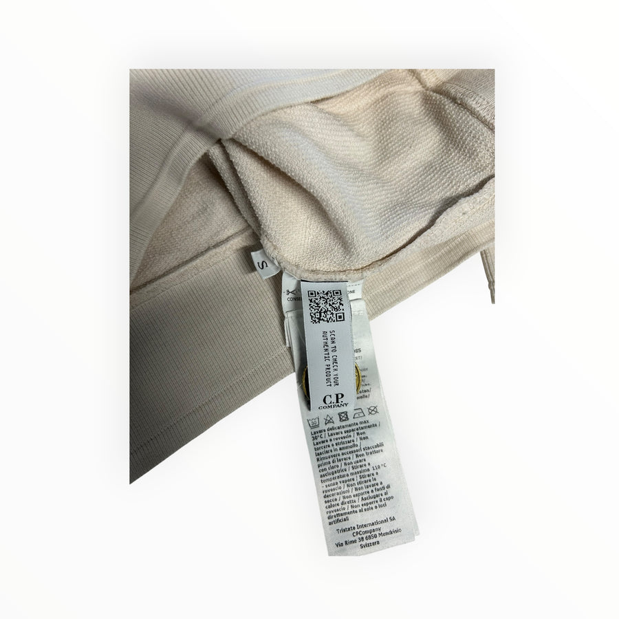 Secondstore C.P. Company beige sweatshirt interior label with authenticity QR code and care instructions
