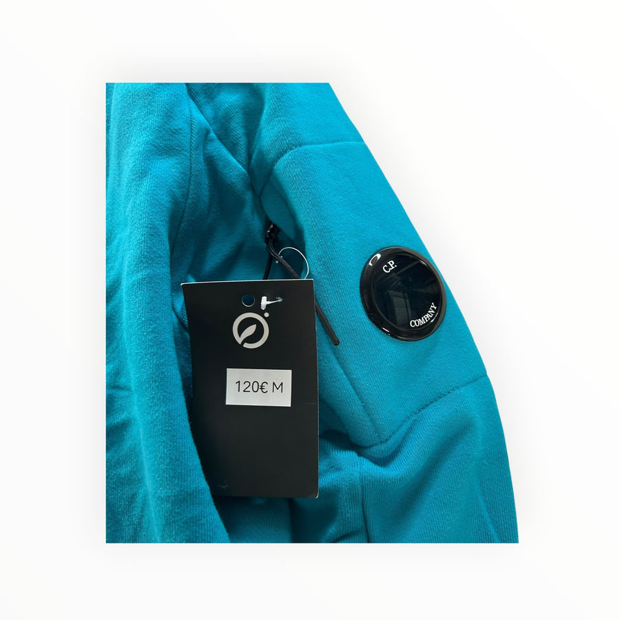 Secondstore C.P. Company teal cotton sweatshirt featuring the iconic black sleeve lens detail and brand tag.